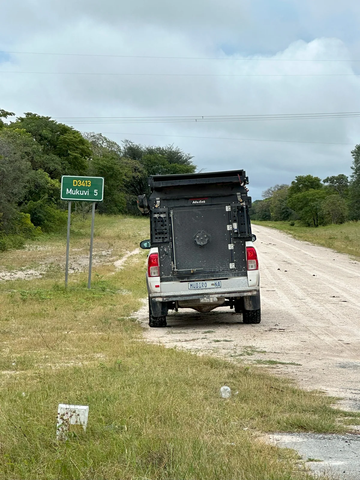 The mobile health pickup travelling along a rural gravel road
